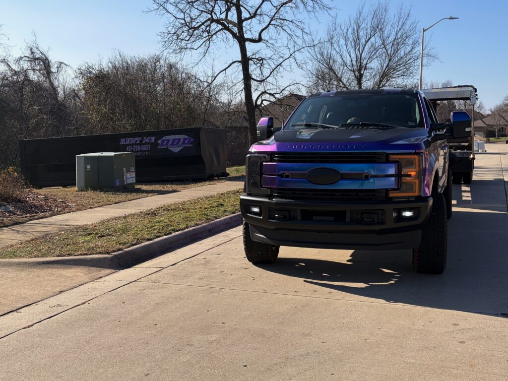 Diamond Dumpsters & Dirtworks truck and roll-off dumpster