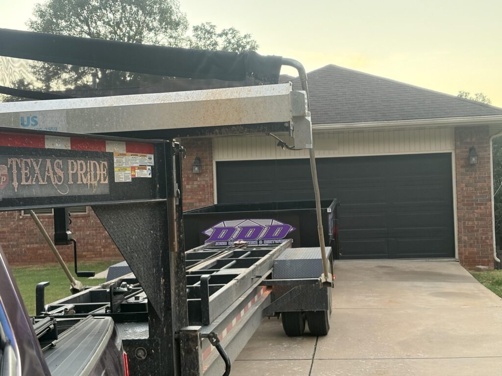 Diamond Dumpsters & Dirtworks roll-off dumpster delivered to a residential driveway in Springfield, MO