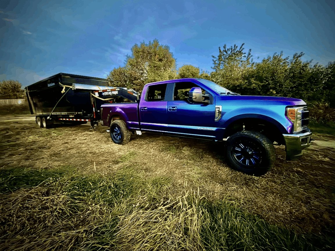 Diamond Dumpsters & Dirtworks truck and trailer